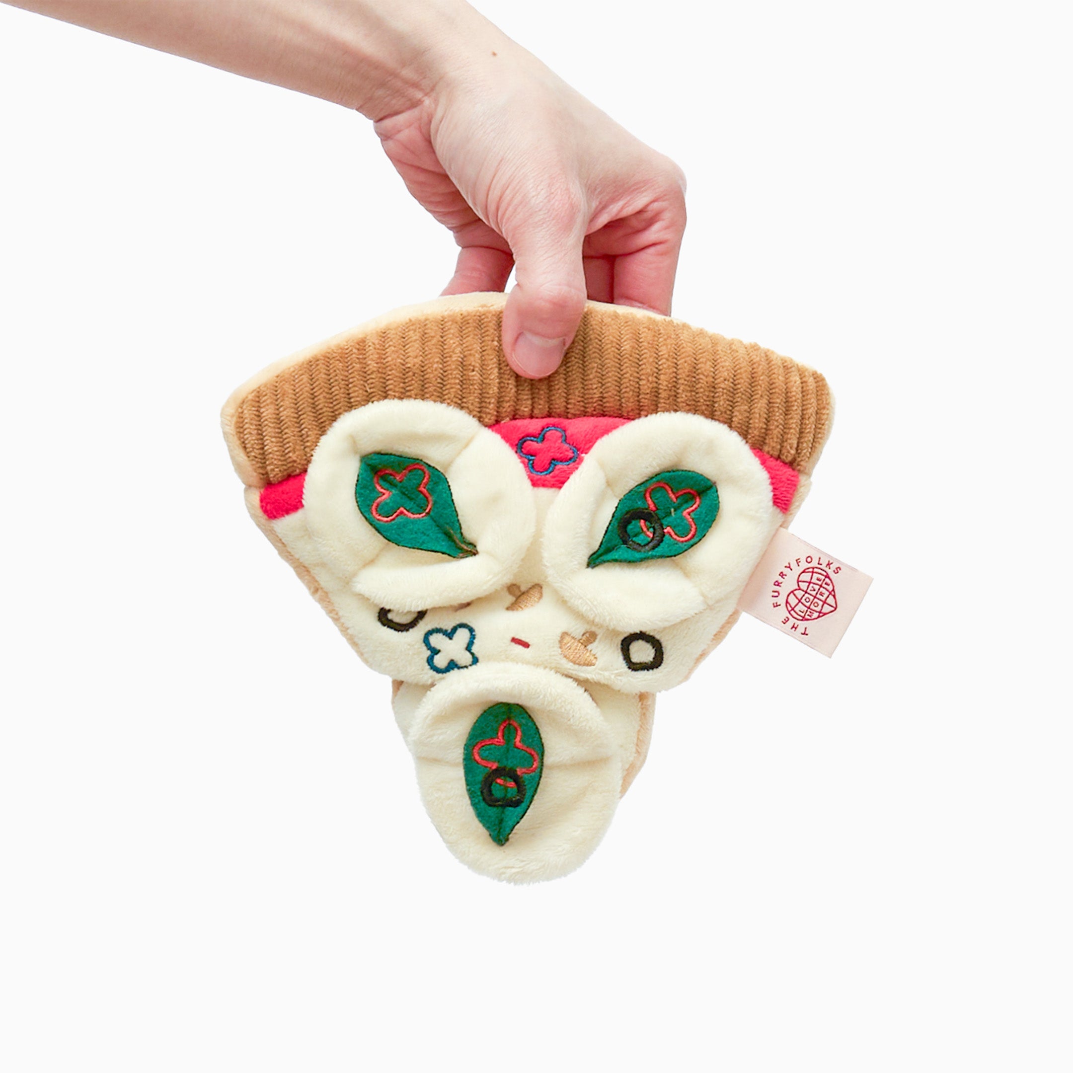 Plush pizza slice dog toy with interactive nosework features, embroidered toppings, and a soft, textured design. Perfect for mental stimulation and playtime fun. Designed by the furryfolks.