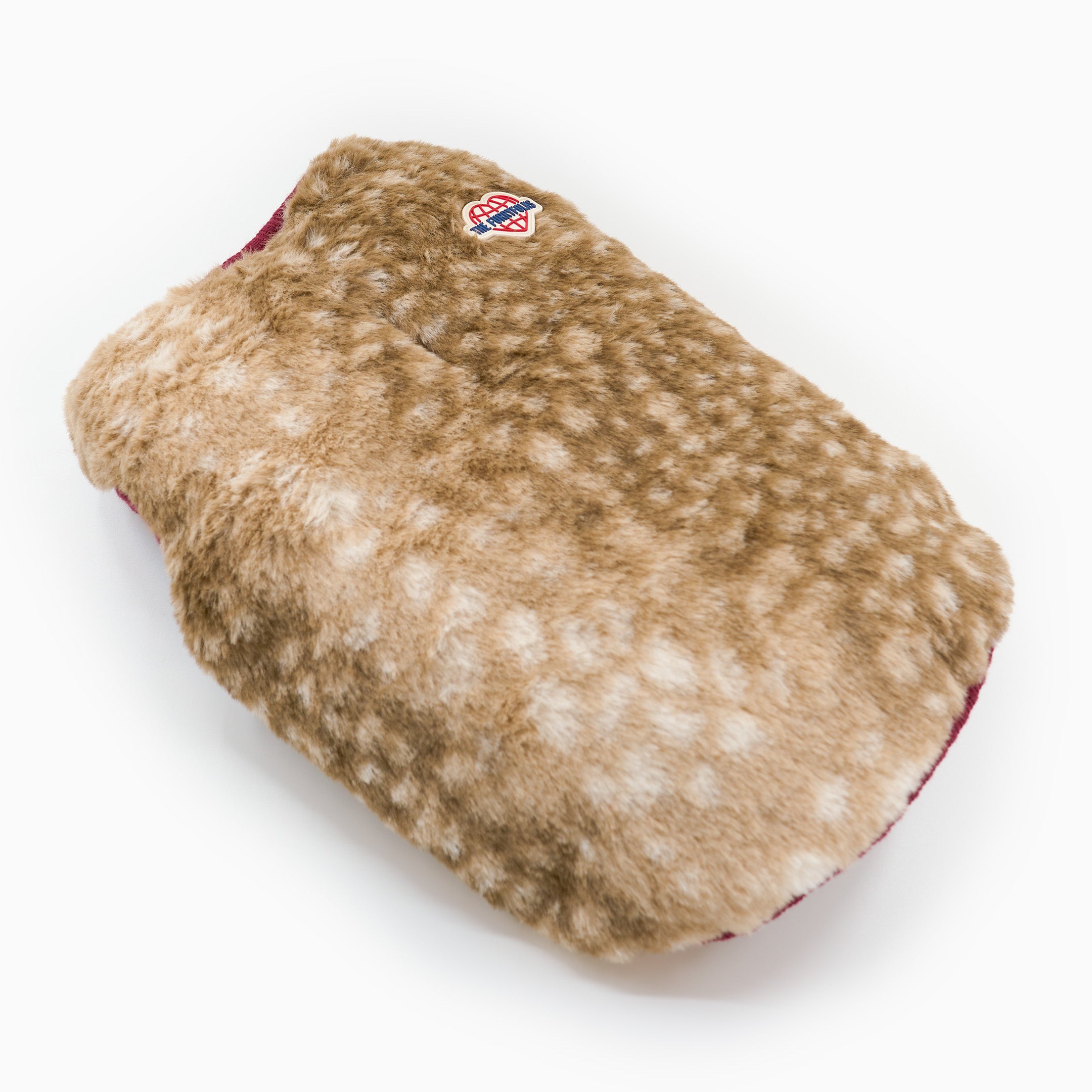 Dog toy with spotted pattern on a white background