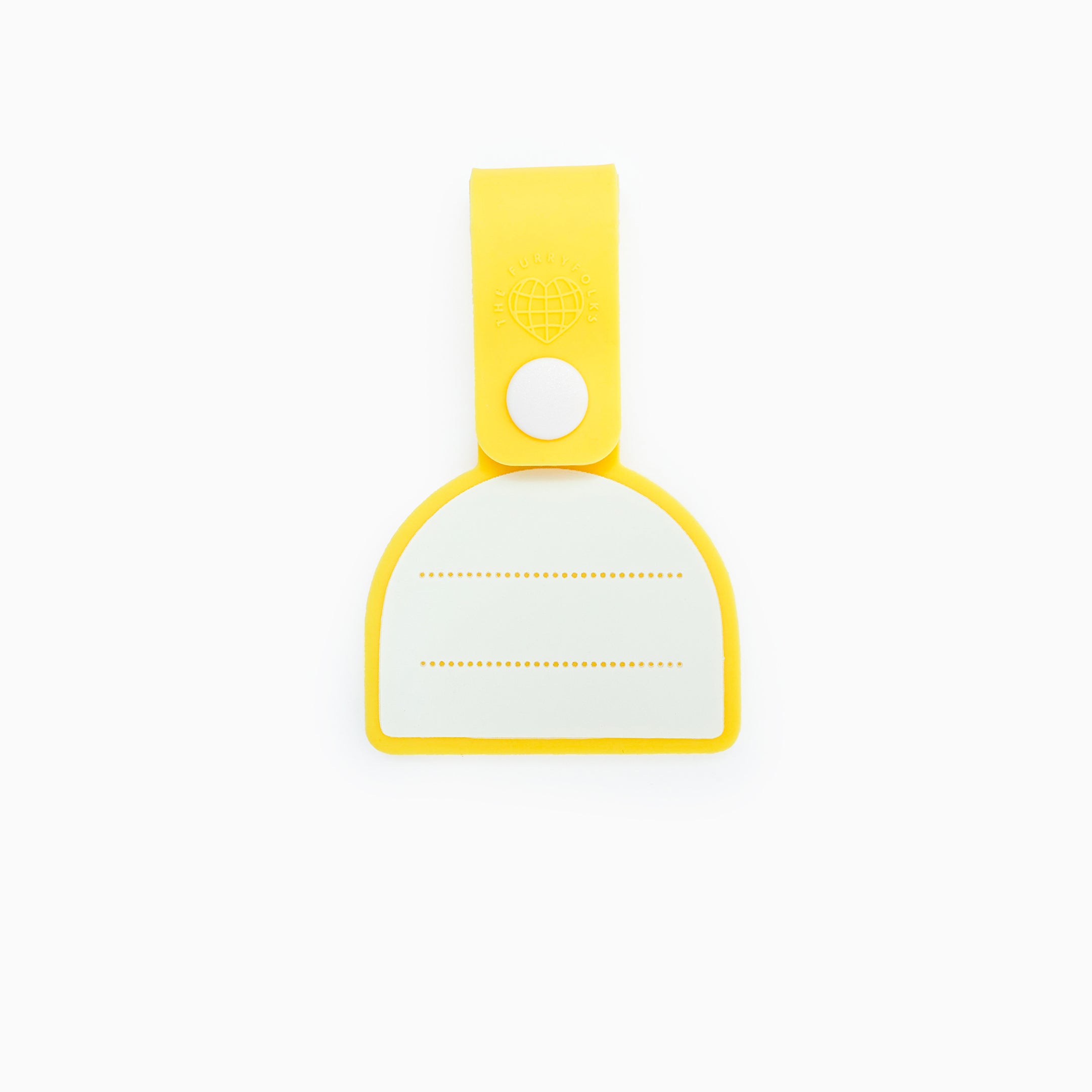 The back of a yellow dog tag with three dotted lines for writing the owner’s name and contact information. The tag is made of non-toxic rubber and has a loop for attaching to a collar or harness, featuring a simple and functional design.